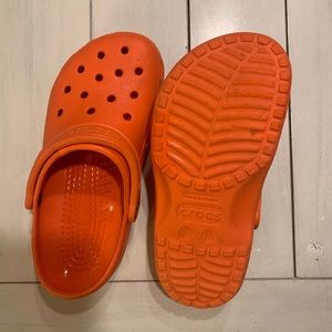 Orange Crocs classic clog